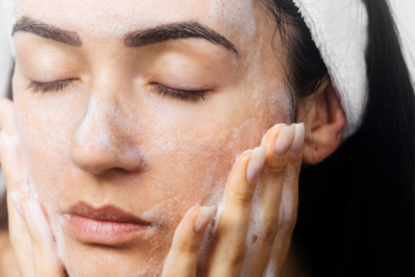 Woman washing her face